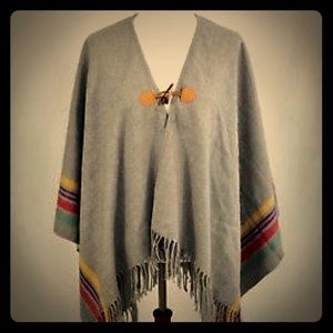 Aerie poncho with fringes